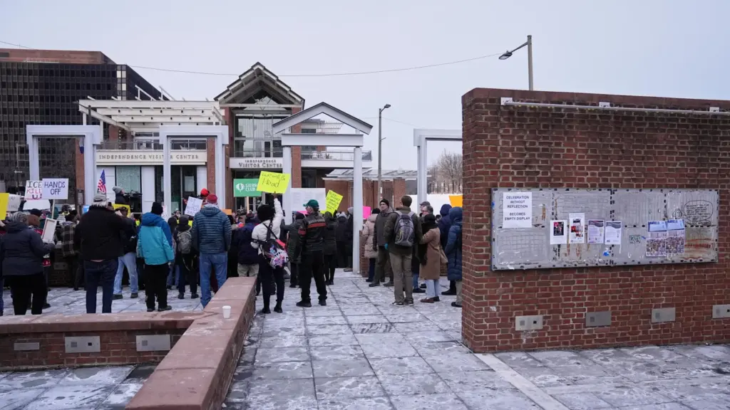 FILE – Demonstrators gather to protest removal of explanatory panels...
