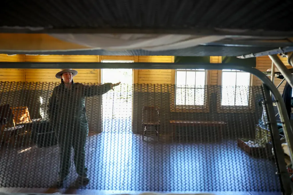 Angel Island State Park Interpreter Casey Dexter-Lee shows the menâs...