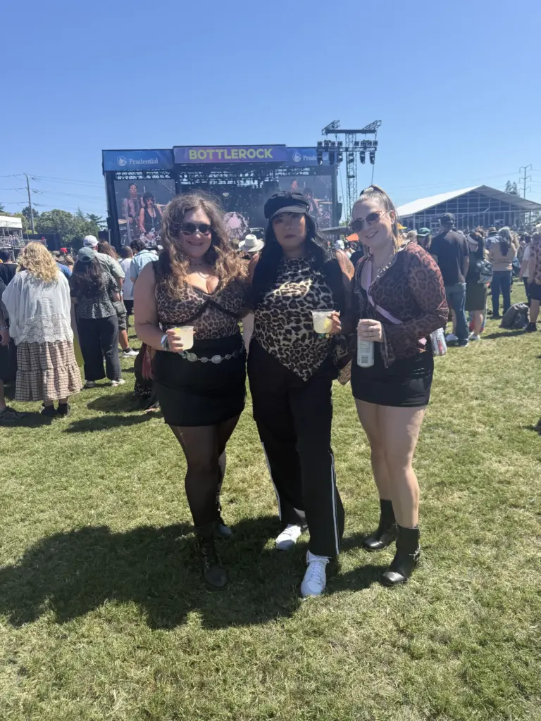 Friends Daniella Caesare, Anna Carr and Kelsey Wolanin wear cheetah...