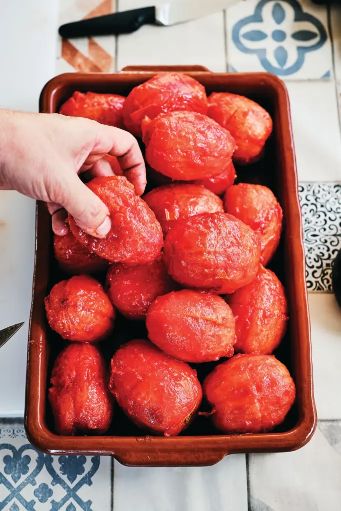 Tomatoes were prepared for salsa de tomate in Chef JosÃ©...