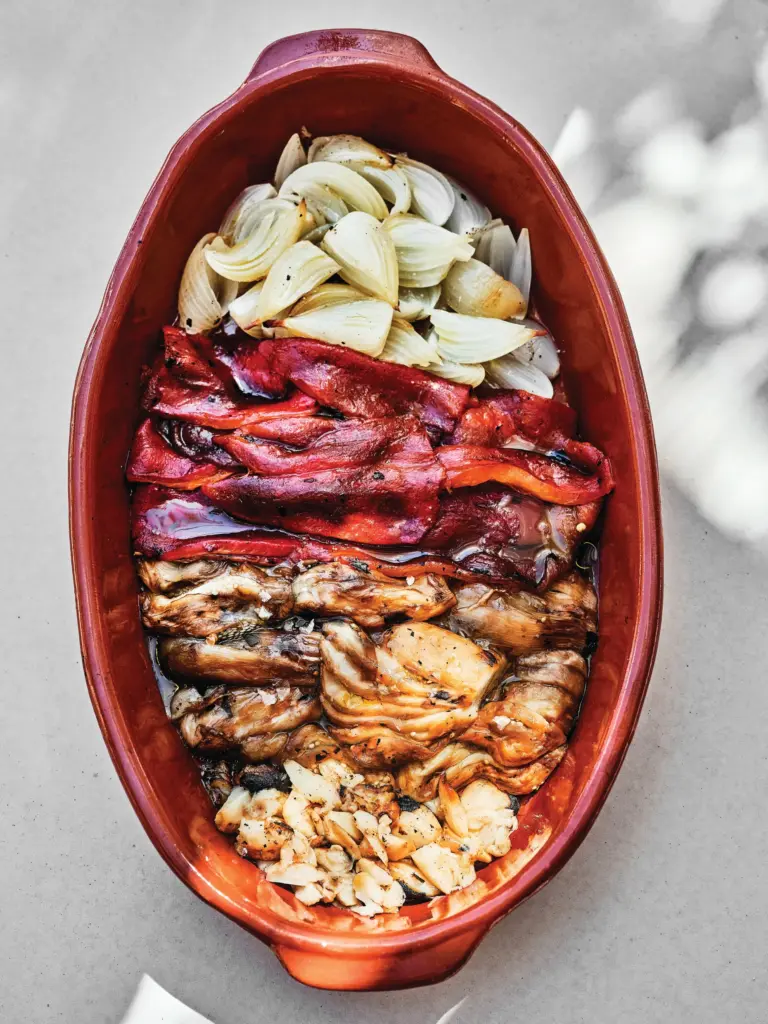 Escalavida â Catalan roast vegetables â is served in a...