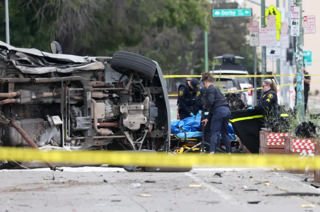 An Alameda County Coronerâs Bureau officers and remove a manâs...