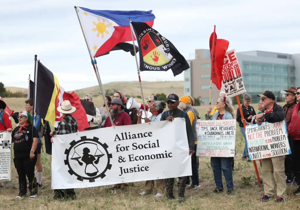 People take part in the âCaminata for Immigrant Rightsâ rally...