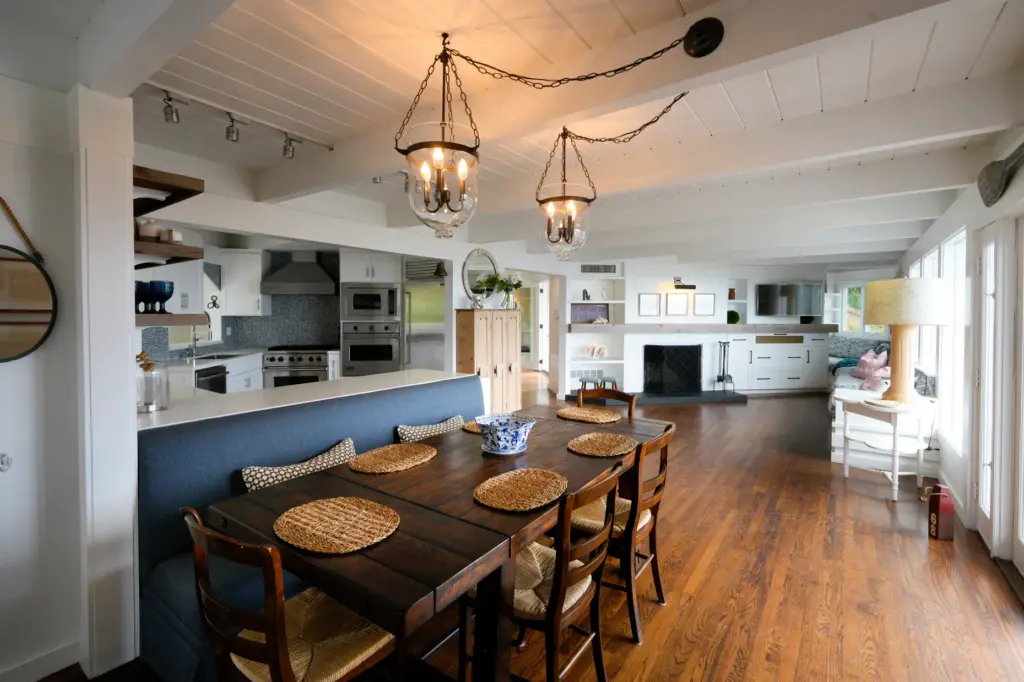 The family dining space, living room, and kitchen are on...