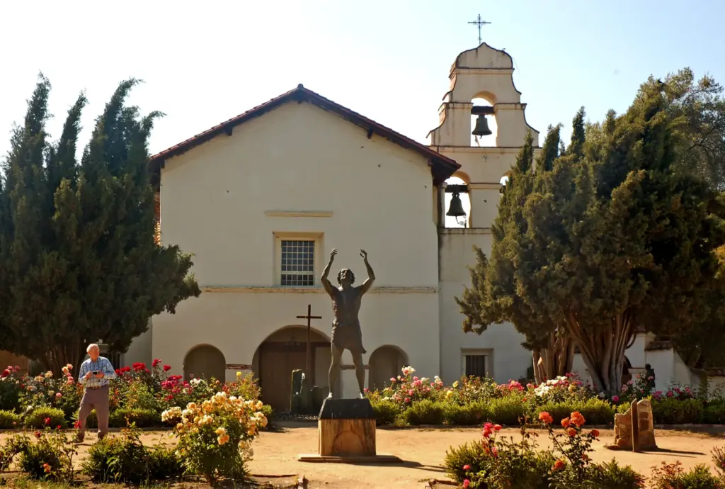 The garden is filled with roses at Mission San Juan...