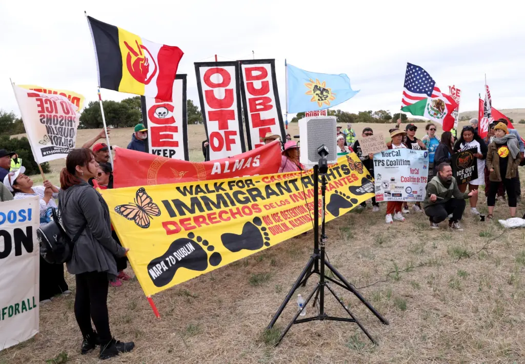 People take part in the âCaminata for Immigrant Rightsâ rally...