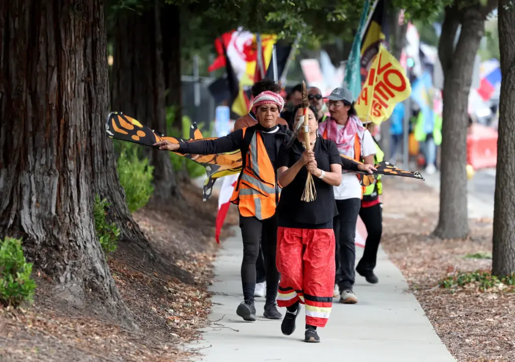 People take part in the âCaminata for Immigrant Rightsâ march...