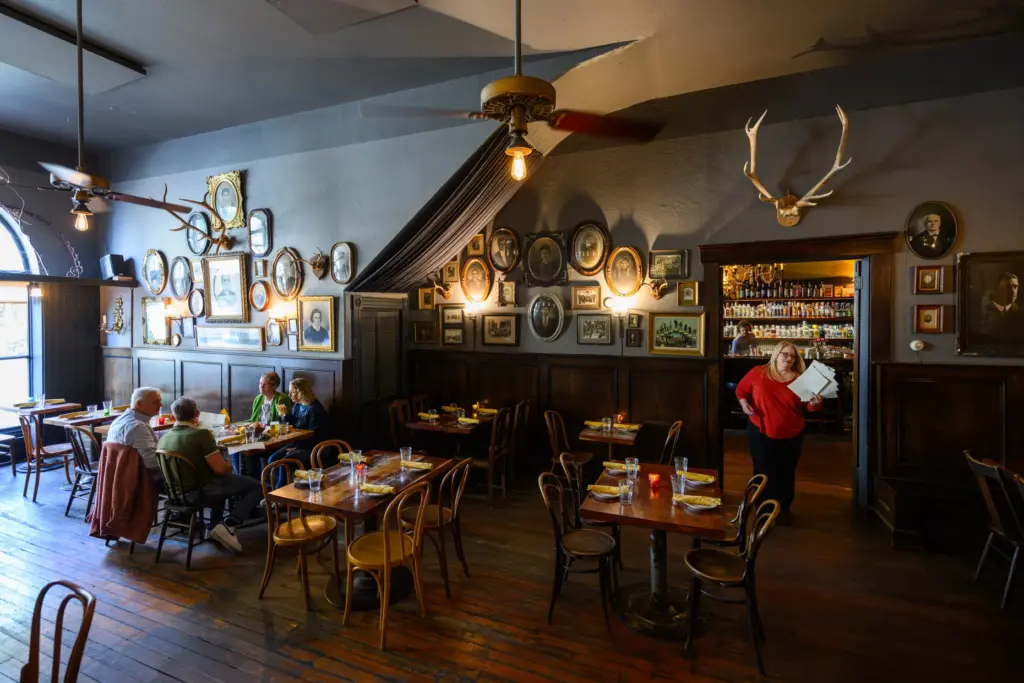 Patrons have dinner at the Bull Valley Roadhouse in Port...