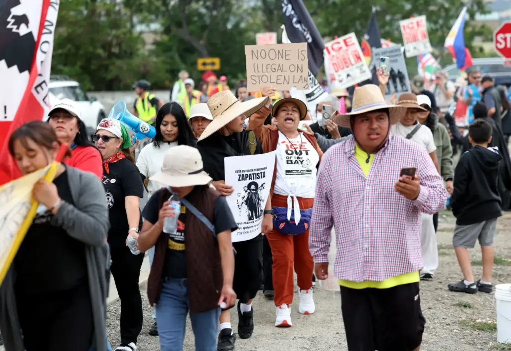 People take part in the âCaminata for Immigrant Rightsâ march...