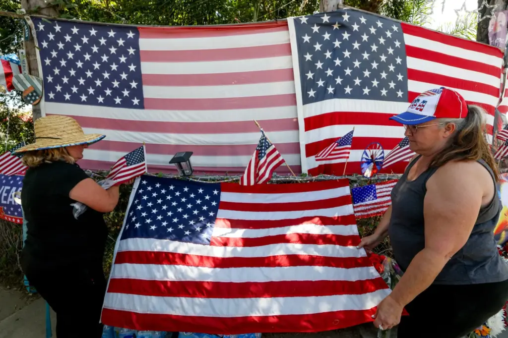 Gina Gille, left, and another woman, who only gave a...