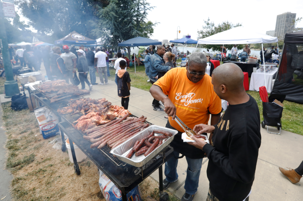Lamont Patton, from Everett & Jones Barbecue cooks up a...