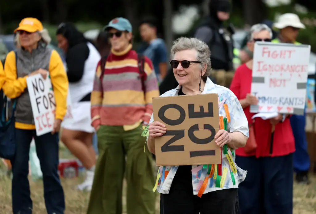 Linda Evans, of Santa Rosa, and others, take part in...