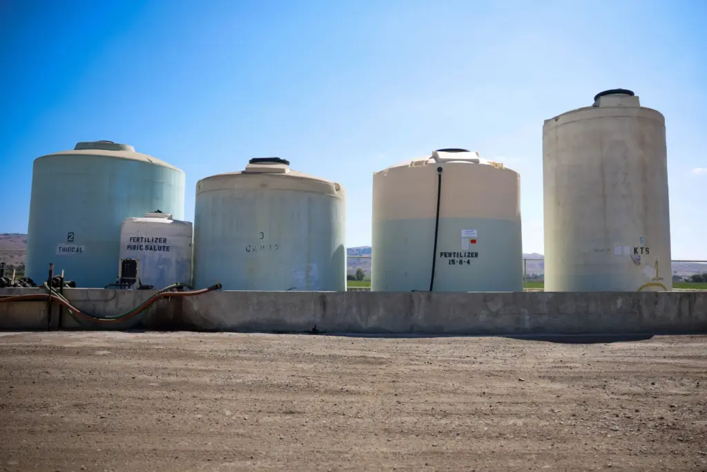 Tanks of fertilizer at B&T Farms in Gilroy, Calif., on...