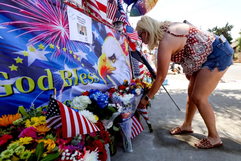 Yesenia Obeso on Monday places a bouquet in front of...