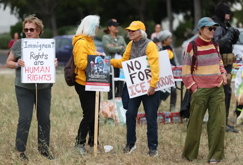 People take part in the âCaminata for Immigrant Rightsâ rally...