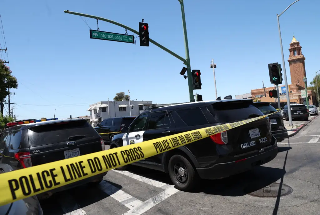 Oakland police investigate a fatal shooting on Seminary Avenue and...