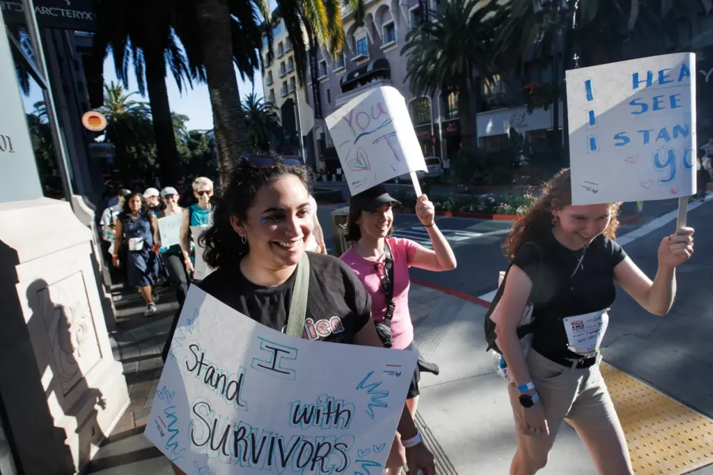 Participants Rubi Runton, 23, of Santa Clara, left, and her...