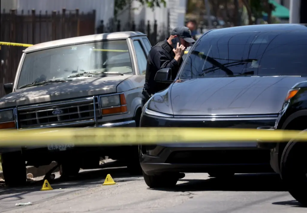 Oakland police investigate a fatal shooting on Seminary Avenue and...