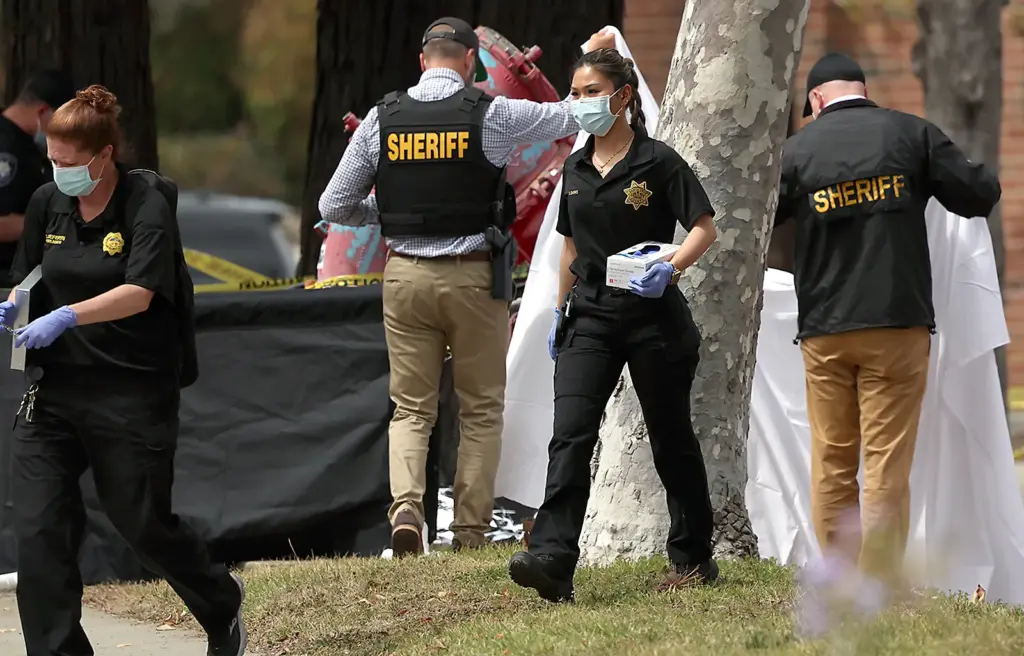 Santa Cruz County sheriffâs deputies process Mondayâs crime scene. An...