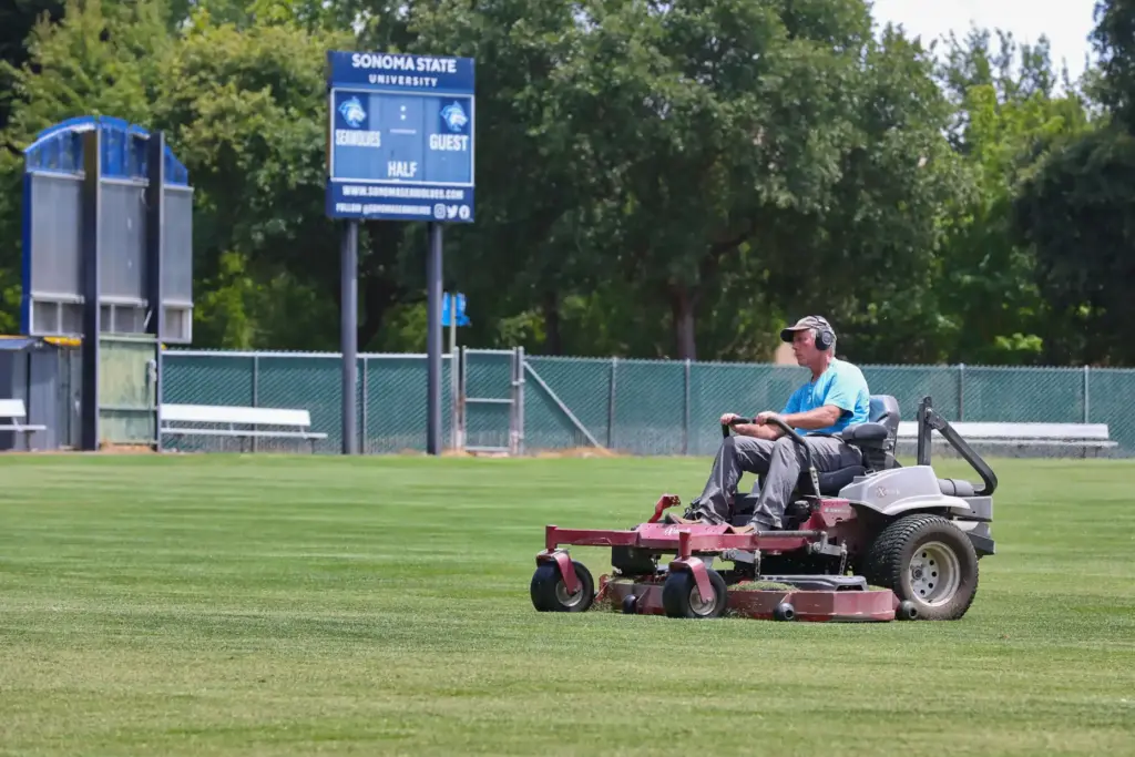 A groundskeeper mows the soccer field at Sonoma State University...