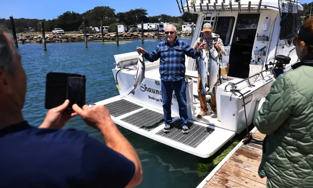 Salmon boat charter captain Mike Harbarth of the Shauna Lee,...