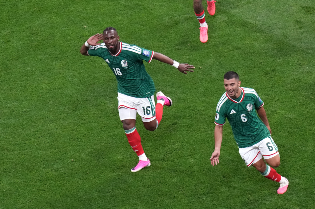 Mexico’s Julian Quinones (16) celebrates after scoring their first goal...