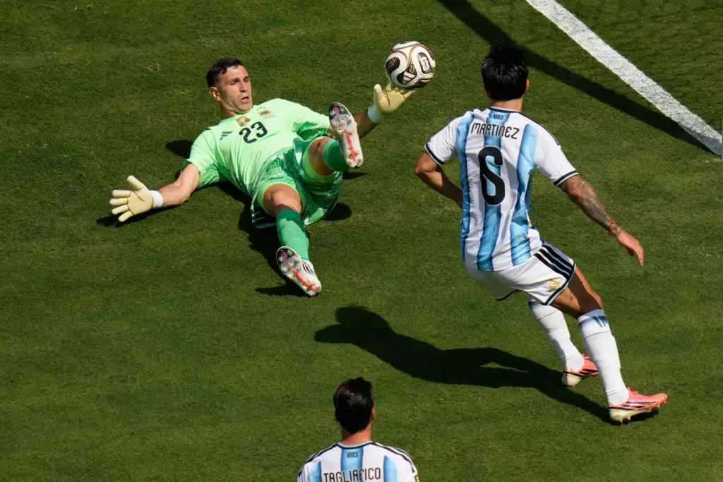 Argentina goalkeeper Emiliano Martinez (23) makes a save during the...