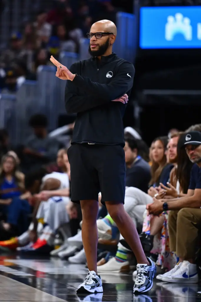 Golden State Warriors head coach Khalid Robinson gestures to his...