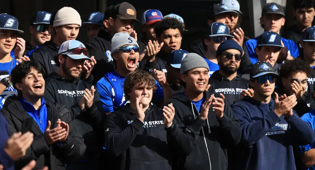 Sonoma State University menâs soccer and baseball student athletes applaud...