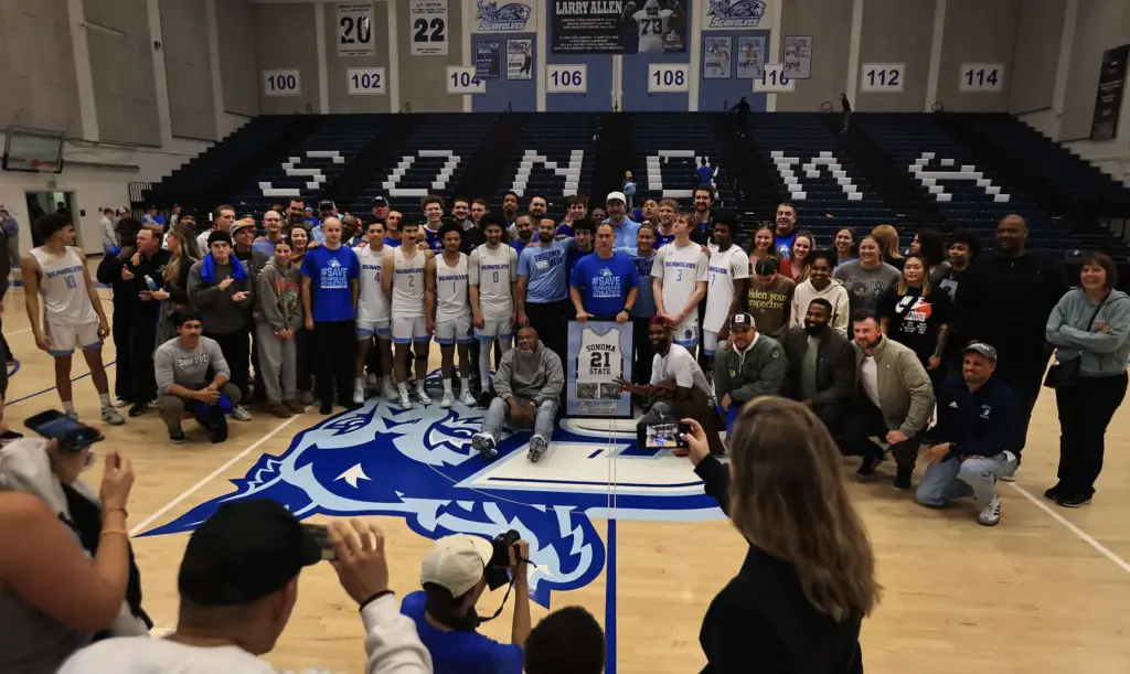 Current and former men’s basketball players of head coach Rich...