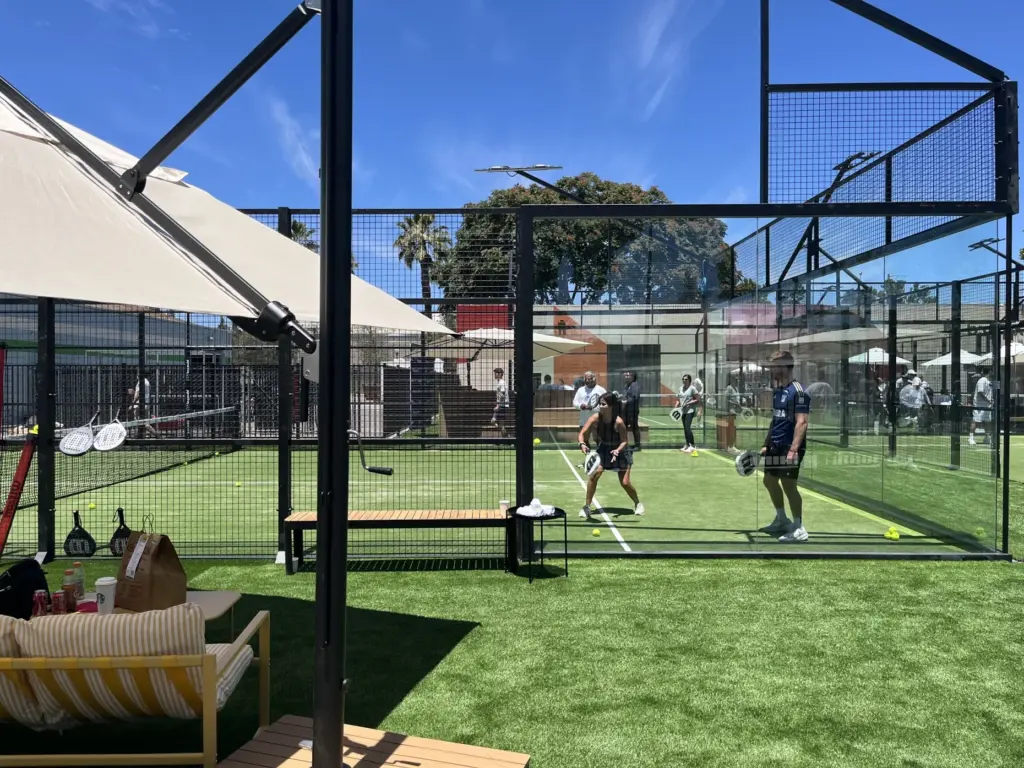 Padel players receive lessons at Bay Padel sports complex within...