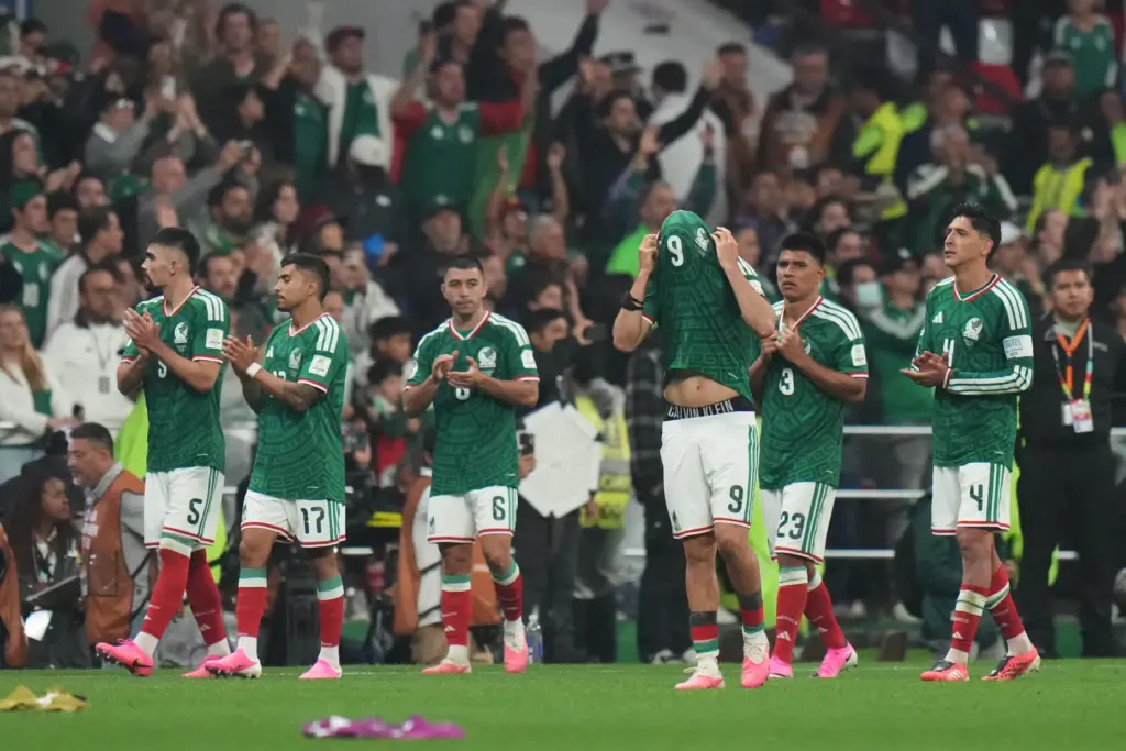 Mexico players react after the World Cup round of 16...