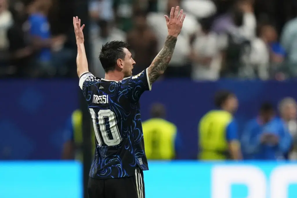 Argentina’s Lionel Messi (10) cerebrates the first goal of his...
