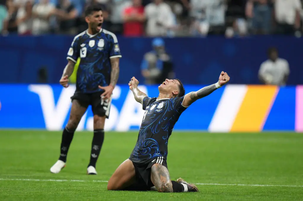 Argentina’s Enzo Fernandez (24) reacts after their win the World...