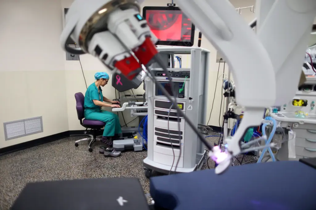 Dr. Rita Kwan-Feinberg with a da Vinci signal port surgical...