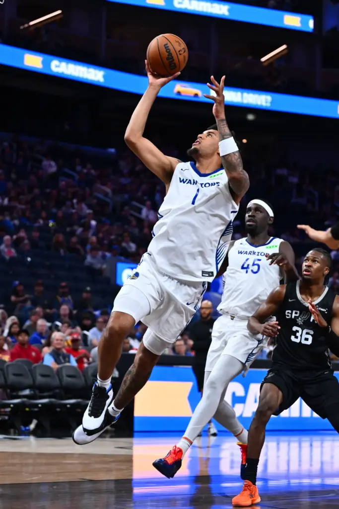Golden State Warriorsâ Yaxel Lendeborg (1) goes up for a...