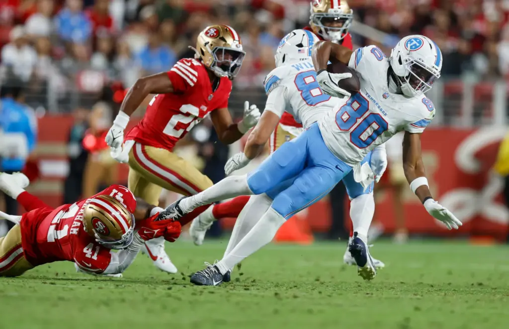 San Francisco 49ers' Jalen Graham (41) tackles Tennessee Titans' Bryce...