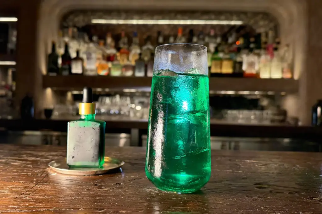 A spicy cocktail called Green Doctor, made with tomatillo, green...