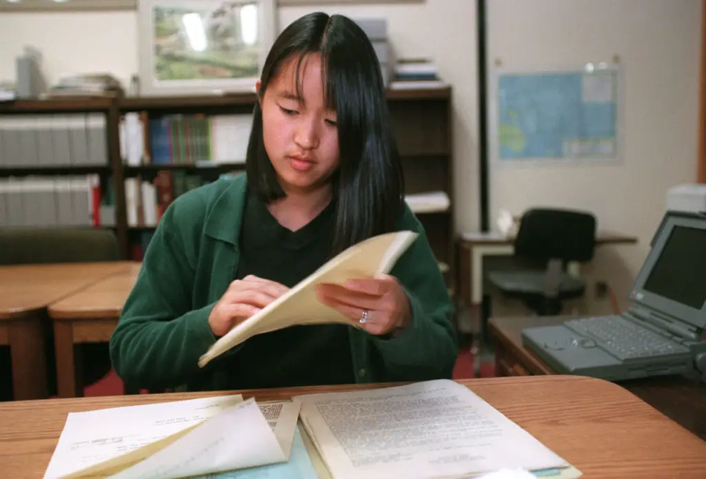 Jennifer Gee, a Stanford Phd student works on transfering Angel...