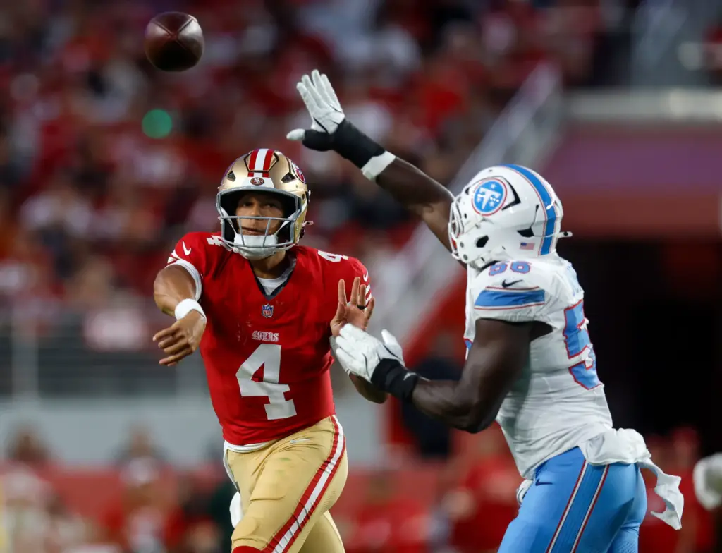 San Francisco 49ers' Adrian Martinez (4) throws against Tennessee Titans'...