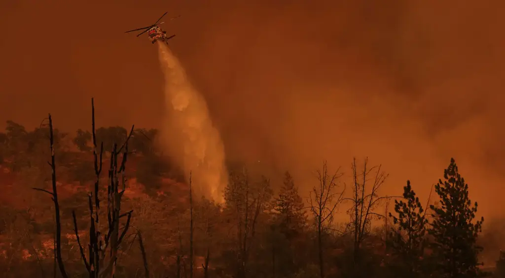 Cal Fire makes a strategic drop as the Pickett Fire...