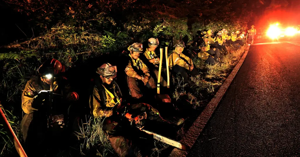 Cal Fire hand crews from Chamberlin Creek Fire Center and...