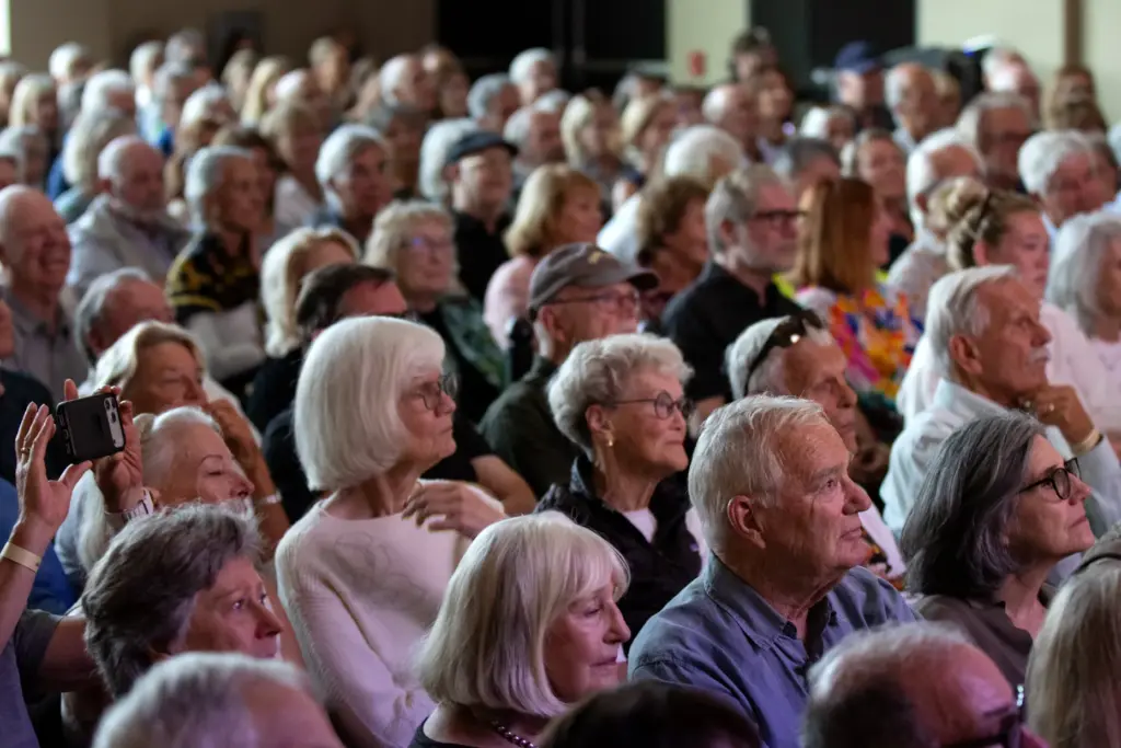 A sellout crowd listens to Steve Wozniak, a pioneer of...