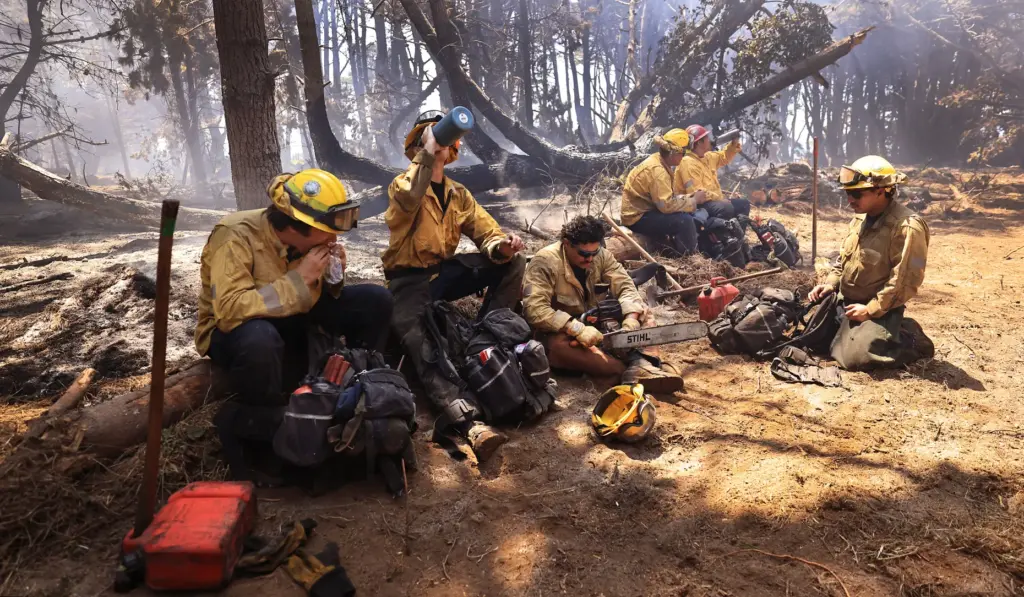 Cal Fireâs Valley View hand crew firefighters take their lunch...