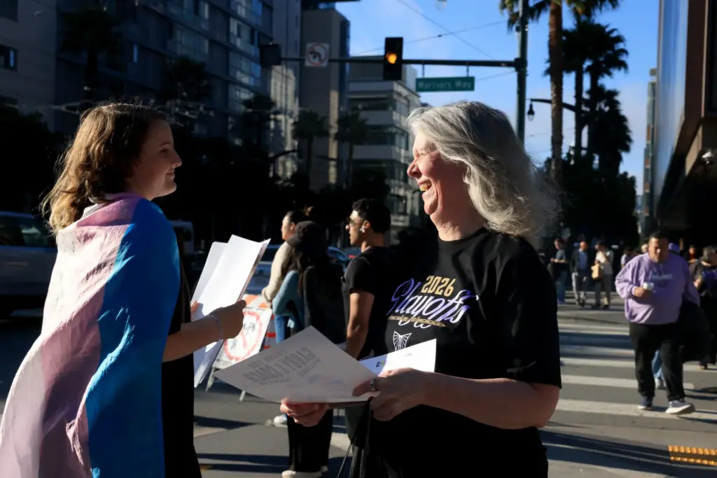 Golden State Valkyries fan, Jennifer Batoy, gets a couple posters...