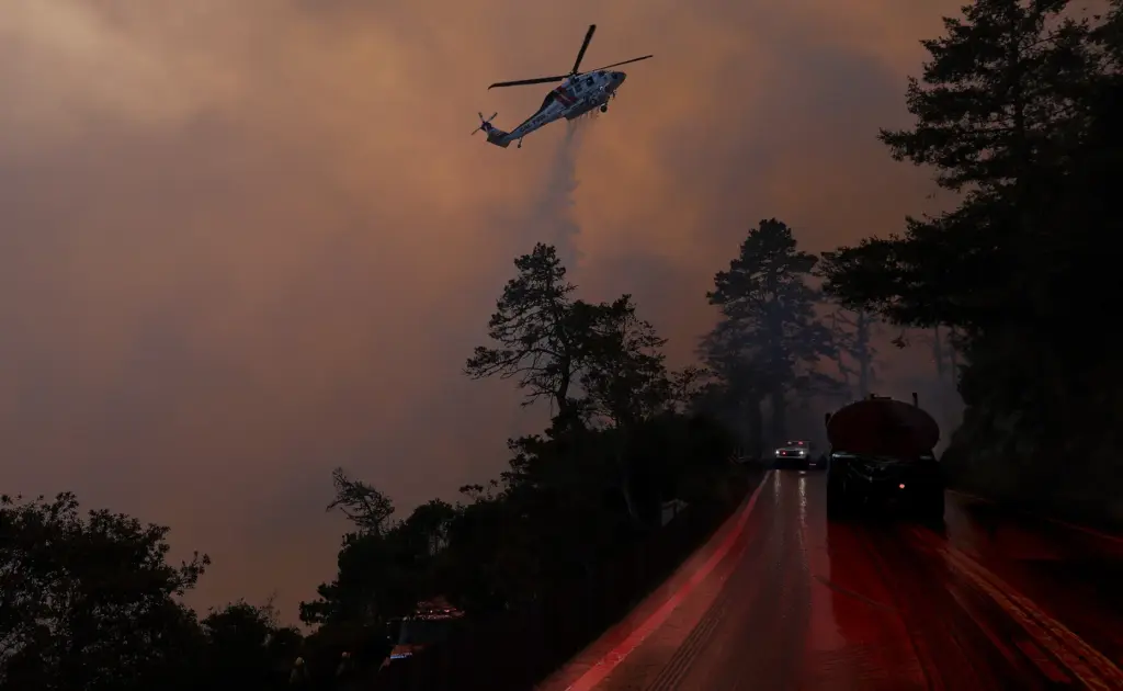 Highway 1 above Ocean Cove is covered in fire retardant...
