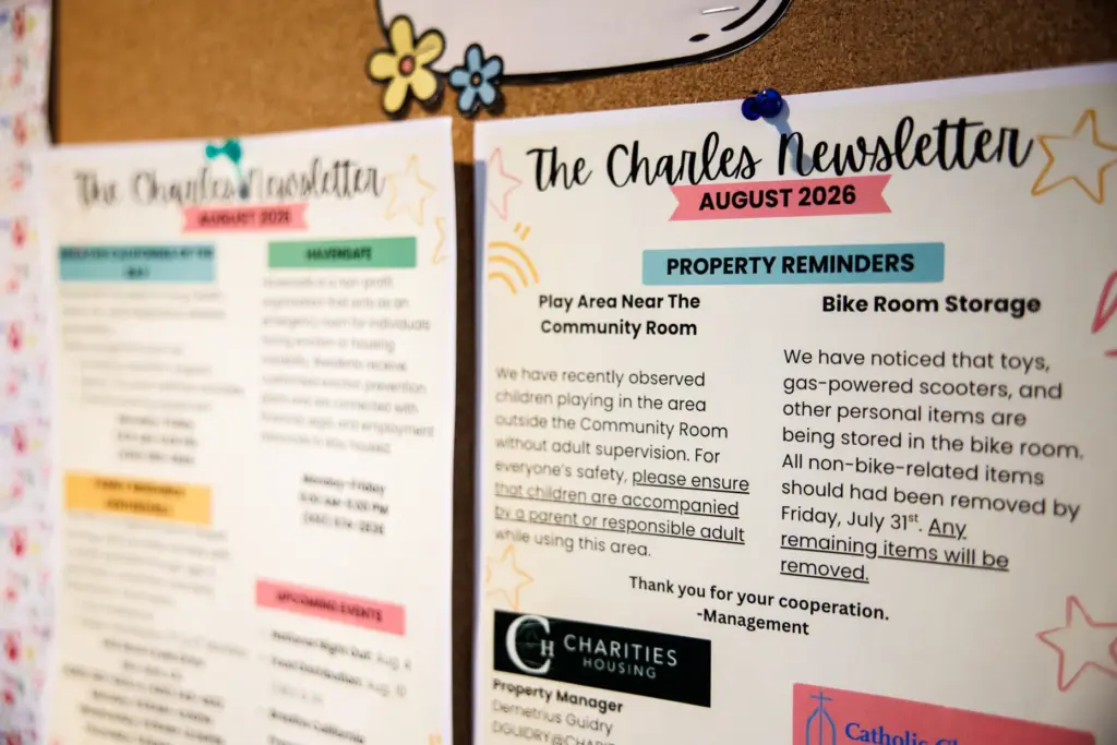 Newsletters for residents are displayed at The Charles, a 99-unit...