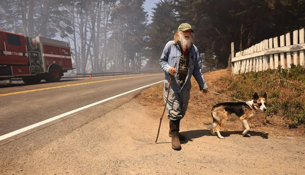 Paul âJerryâ Rudy, 91, with his dog Nicholas, walk the...