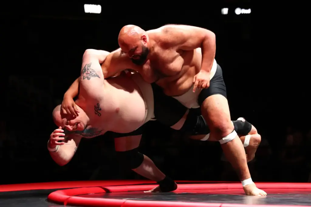 Egypt’s Abdelrahman “Sandstorm” Shalan, right, takes down Jim Grammer of...