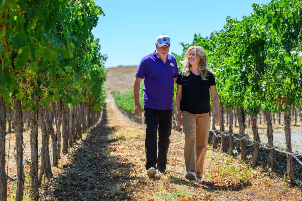 Darcie Kent Estate Winery co-owners David Kent, left, and his...